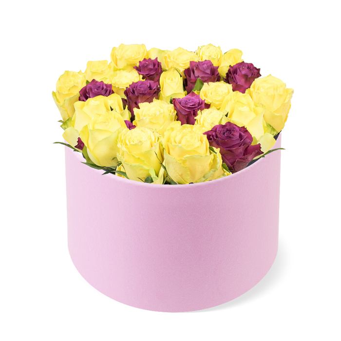 An elegant, contemporary arrangement arrives in a round pastel pink box, its soft-touch surface inviting to the touch. The box sits on a clean white background, the lid hidden or tucked away as the front scooped opening reveals a generous cluster of blooms. The bouquet is dominated by soft yellow blooms-miniature roses or carnations-packed into a compact, rounded silhouette that suggests both abundance and polish. Interlaced among the yellows are smaller burgundy or burgundy-tinged roses, adding a luxe contrast that elevates the palette. The roses are arranged tightly so that the colors meld into a seamless field of sunshine punctuated by wine tones. Foliage is kept deliberately minimal, letting the hues take centre stage. The box itself appears to be made of a soft-touch material, perhaps velvet or suede, contributing to the high-end feel and luxurious presentation. The overall look is contemporary, refined, and ideal for modern gifting-perfect for birthdays, anniversaries, or a stylish home-styling statement. In the Brent Cross area, this design would travel quickly for same-day delivery to nearby flats and houses, arriving in pristine condition and ready to delight. The arrangement is the work of a local florist who understands the rhythm of the city-balancing brightness with elegance, energy with restraint. Its crisp lighting, precise placement, and generous dome make it a striking feature in any room, a cheerful beacon that speaks of celebration and thoughtful intention.