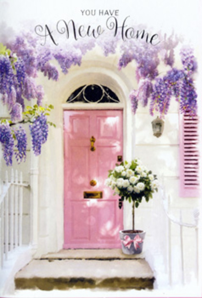 The image evokes the feeling of stepping up to a newly claimed home in Brent Cross, with flowers and soft colour quietly announcing a fresh start. A pale pink front door stands at the centre, its panels subtly defined by natural daylight that seems to wash down the surface, creating faint highlights and shadows. The surrounding walls are whitewashed, their slightly rough texture catching the light in a way that gives the entrance an airy, open feel, reminiscent of the peaceful streets around Brent Cross and Hendon. One side of the doorway is accented by a painted shutter in soft, muted tones, helping frame the view. Above and around the top of the door, wisteria in full lavender bloom cascades in loose, trailing garlands. Each hanging cluster of blossoms creates a sense of movement, as if a breeze might stir the petals at any moment, and the imagined fragrance is delicate and sweet. On the stone step below, a grey metal bucket rests close to the door, repurposed as a rustic-chic container for an abundant bouquet. Inside, white and cream roses bloom generously, their petals layered and luxurious, forming rounded shapes that nestle comfortably together. Threads of soft green foliage emerge between the blossoms, adding depth and a hint of garden freshness. Around the bucket's base, a pink satin ribbon is tied in a neat, unfussy bow, its sheen catching the light and echoing the blush hue of the door. The atmosphere is calm and expectant, the sort of scene that might greet someone returning from a walk through nearby parks or from errands in Brent Cross. It feels like a housewarming gesture in floral form-an arrangement that expresses congratulations, welcome, and the quiet hope that this address will soon feel deeply, unmistakably like home.
