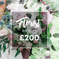 In a soft, cinematic study of color and texture, this Florist Choice bouquet unfolds like a whispered vow of elegance. Pale blush roses unfold into creamy waves, their petals catching the light in a way that feels almost edible, while white anemones with deep, nocturnal centers provide a piercing point of contrast. Sage and silver tones from eucalyptus mingle with the blue-grey sparkle of eryngium, giving the arrangement an unexpected edge yet keeping the palette serene. The bouquet is set against a gentle, dreamlike background, as if photographed in a bright garden at dawn near Brent Cross. A semi-transparent white rectangle frames the center, bearing Florist CHOICE and the bold ?200, reminding the viewer of a bespoke service curated by our NW London studio. The blooms sit among lush foliage with touches of burgundy leaves, adding depth and sophistication. The arrangement feels both timeless and modern, suitable for weddings, anniversaries, or as a lavish centerpiece for home or event décor. It is a testament to the florist's eye for balance, texture, and scent-soft petal against crisp geometry, warm tonalities against cool accents. Available for delivery across Brent Cross and surrounding NW London neighbourhoods, this bouquet speaks of trust, freshness, and the art of personal, local service, crafted with care for the people of Cricklewood, Golders Green, and beyond. Its scent of green leaves and garden blooms lingers, inviting compliments and joyful celebrations.