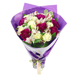 This image shows a carefully composed hand-tied bouquet standing out against a clean white background, every bloom and fold of paper captured in fine detail. Creamy white roses form the focal point, their petals layered in tight, concentric whorls that soften elegantly towards the outer edges, suggesting a gentle fragrance and timeless romance. Surrounding them are rich magenta carnations, their plush, densely ruffled petals creating rounded, tactile shapes that add drama and a sense of abundance. Threaded among these fuller blossoms are stems of white alstroemeria, their slim petals lightly streaked with pinkish-red and centred with dark stamens that introduce intricate, dotted detail when viewed closely. Lush green foliage, including a few subtly variegated leaves, fans out between the flowers, offering freshness, structure, and a natural rhythm that feels reminiscent of morning walks by the green pockets and quiet streets near Brent Cross. The bouquet is artistically shaped into a domed top that gently narrows along the stems, evidence of a skilled florist's hand. Around the base of the blooms, a crisp inner layer of white wrapping paper frames the arrangement, acting almost like a collar or mat around a painting. Over this, a translucent sheet of purple cellophane or tissue is folded and gathered, its crinkled surface catching light and deepening the magenta tones of the carnations, giving the entire piece a festive, almost gift-wrapped quality. The stems are cinched securely with a bright green satin ribbon tied into a polished bow that gleams softly and harmonises with the foliage. A small, pale brown rectangular gift tag hangs from the ribbon, ready for a message of celebration, sympathy, or gratitude to someone in Brent Cross. The bouquet radiates warmth, joy, and thoughtful intention, ideal for marking life's milestones or brightening an ordinary day.