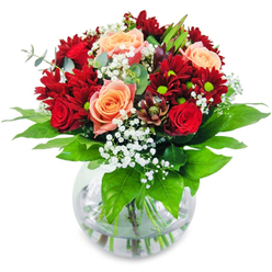 Imagine lifting this enchanting bouquet in your arms, crafted with the signature style of Brent Cross Flowers. The velvet of each crimson rose and deep red chrysanthemum brushes gently against your fingers, while delicate gypsophila flutters like bright snowflakes-reminiscent of frosty mornings near Brent Reservoir. The soft glow of peach and apricot roses mellows the passionate reds, radiating a comforting warmth. Sturdy green stems, submerged in crystal clear water, guarantee lasting freshness, ready to be admired at a family gathering or a special celebration off Hendon Way. Each element is expertly chosen and arranged, reflecting the trusted artistry of local florists in NW11. A refreshing hint of greenery blends with the sweet aroma of fresh roses, creating a bouquet that invigorates the senses and lights up any space-from a birthday table to a romantic dinner. Moments of congratulations or quiet reflection are perfectly marked by these thoughtfully composed blooms, designed for joyous occasions and spontaneous acts of kindness alike in Brent Cross.