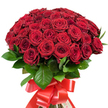 An impressive display of affection, this bouquet from Brent Cross features around fifty radiant red roses, densely clustered into a rounded, theatrical composition evocative of passion and elegance. Each rose-freshly picked by local experts-displays velvet petals in luscious scarlet hues, from perfectly tight buds to open flowers revealing their intricate architecture. Lush, dark green leaves weave through the mass of roses, providing a vital contrast that echoes the leafy surroundings of Brent Cross's residential lanes. The bouquet's stems are expertly gathered and enveloped in a luxurious, wide red satin ribbon, crafted into a large, graceful bow whose shining trails add a touch of celebration. Presented against a pristine white backdrop, the arrangement commands attention, evoking the timeless significance of love, devotion, and heartfelt connection-whether marking an anniversary, a significant birthday, or a romantic surprise for a Brent Cross delivery. Carefully designed for both beauty and emotional impact, this bouquet stands as a testament to the enduring artistry of Brent Cross's best local florists.