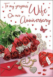 This anniversary image unfolds like a private love letter laid out in flowers and keepsakes, the kind of thoughtful scene you might find in a Brent Cross home just before a surprise is revealed. At the heart of the composition is a close-knit cluster of red roses, their petals lush and velvety, layered in rounded spirals that create a sense of depth and softness. The roses are framed by arcs of fresh greenery, which provide gentle contrast and bring a natural, garden-fresh feel to the arrangement. Resting beside the bouquet is an envelope with a co-ordinating card, slightly askew as if recently opened, its elegant script suggesting deeply personal words within. A small heart-shaped keepsake box sits nearby, along with a glimpse of fine jewellery that catches the light in delicate glints, recalling anniversary gifts chosen with care in shops near Brent Cross Shopping Centre. The surface under everything shimmers with subtle reflections, sprinkled with tiny scarlet hearts and jewel-like decorations that echo the theme of love and celebration. A single butterfly detail floats among these accents, introducing a dreamy, whimsical note that hints at renewal and hope. The colours are rich yet soothing, dominated by passionate reds, lifted by creamy whites, gentle blush tones, and fresh green foliage. The varied textures - silky petals, cool metal, smooth card - invite the imagination to touch and feel. This carefully balanced scene reflects the skill of a local florist who understands how to capture lasting affection, making it an ideal visual story for marking special anniversaries across Brent Cross and the nearby residential streets.